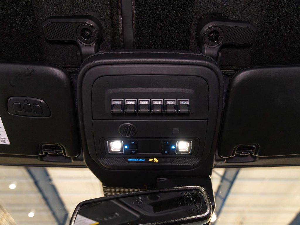 Car interior overhead console with buttons and lights. - Monarch Showroom